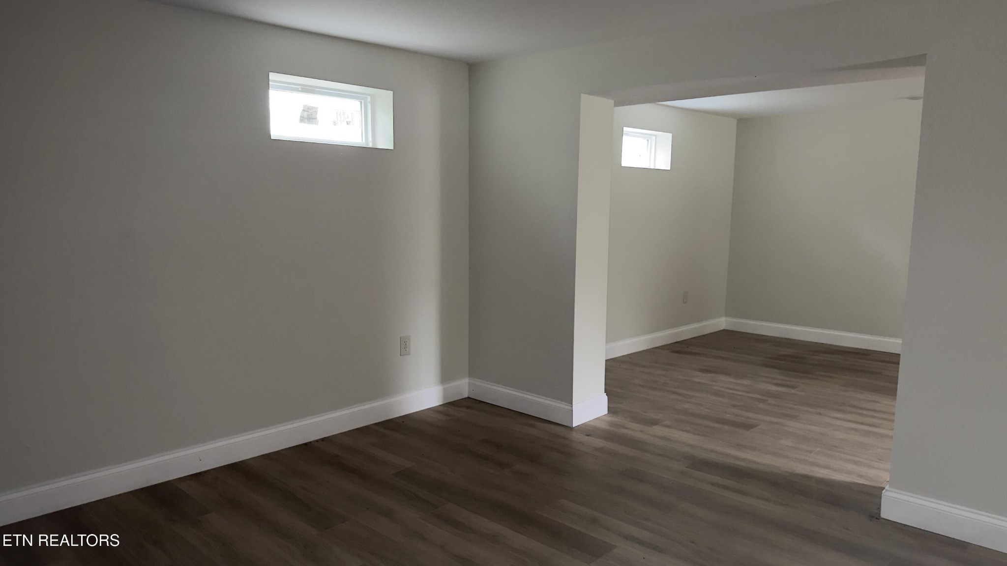 2662 Louisville Road Maryville, TN 37801 - Photo 25 of 60 an empty room with wooden floor and windows