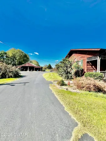 a view of a house with a swimming pool