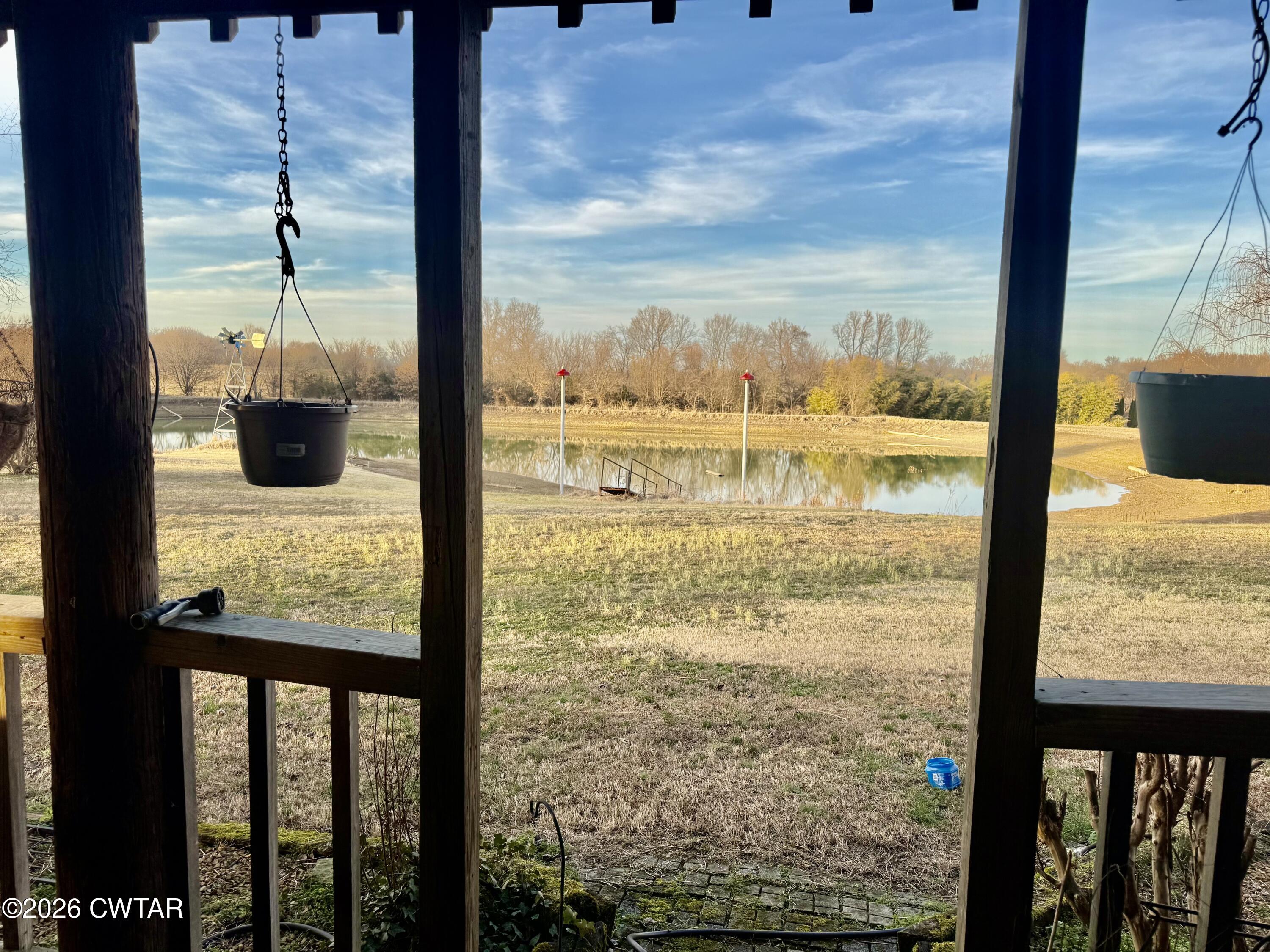 5082 Claude Tucker Road Union City, TN 38261 - Photo 16 of 20 a view of a glass door with a from a window