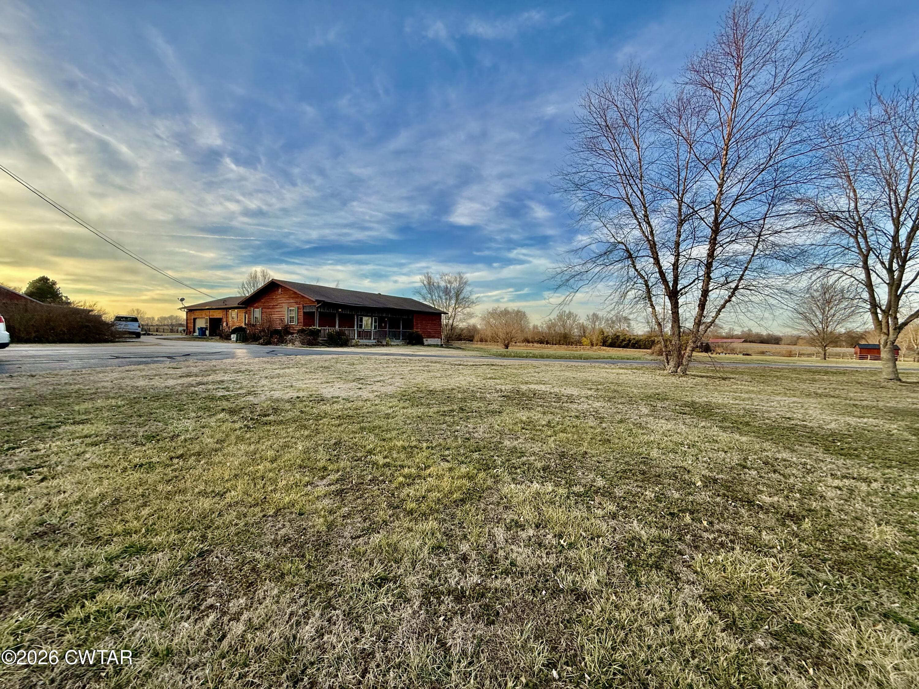 5082 Claude Tucker Road Union City, TN 38261 - Photo 18 of 20 a view of yard with swimming pool and green space
