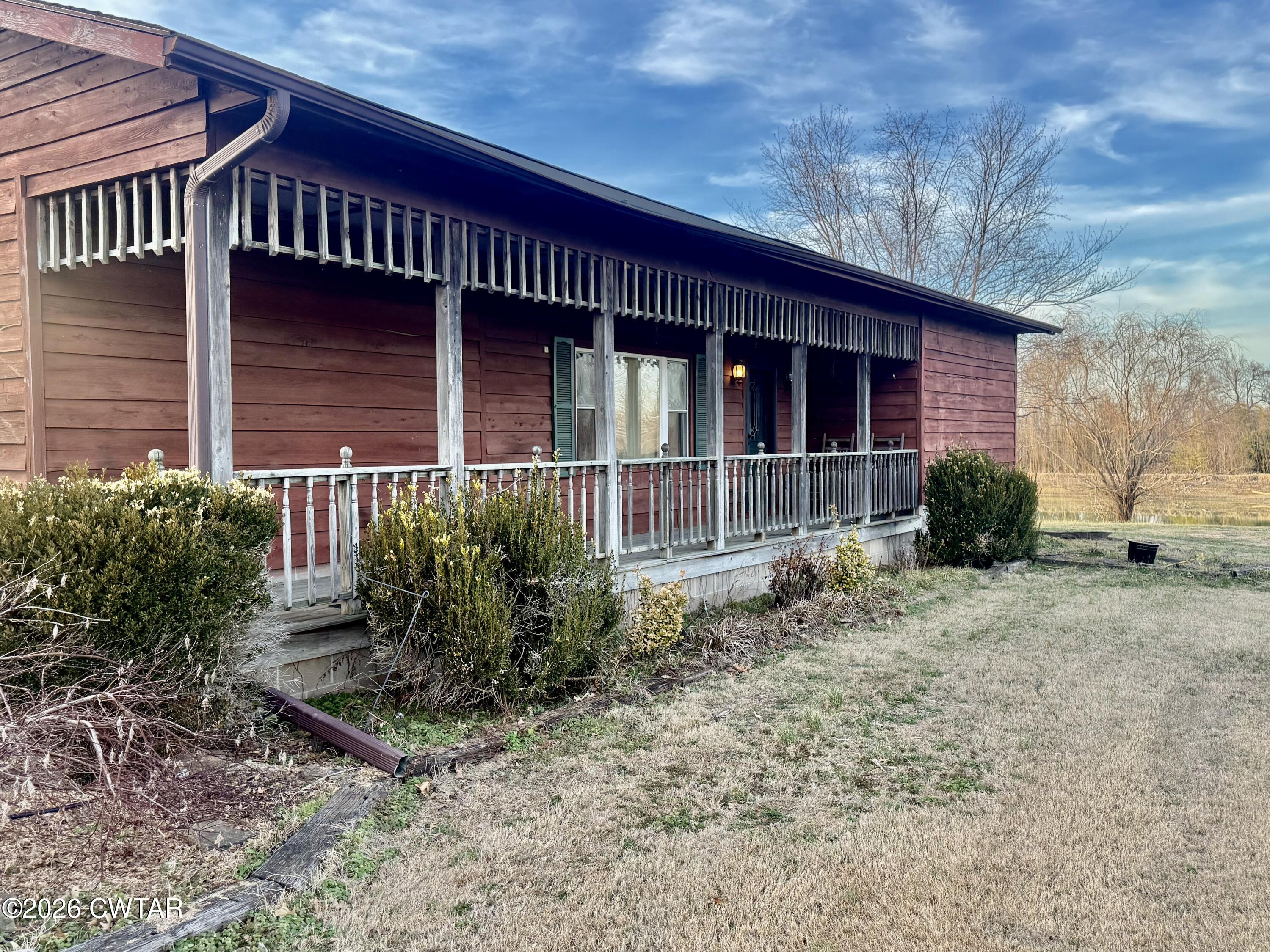 5082 Claude Tucker Road Union City, TN 38261 - Photo 20 of 20 a front view of a house with garden