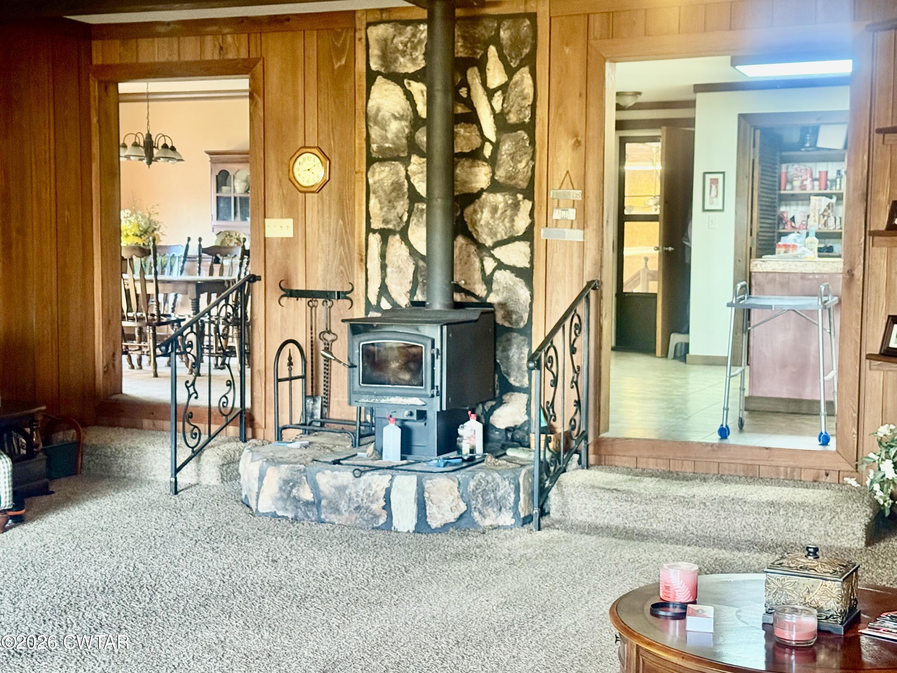 5082 Claude Tucker Road Union City, TN 38261 - Photo 3 of 20 a living room with fireplace furniture and a large window