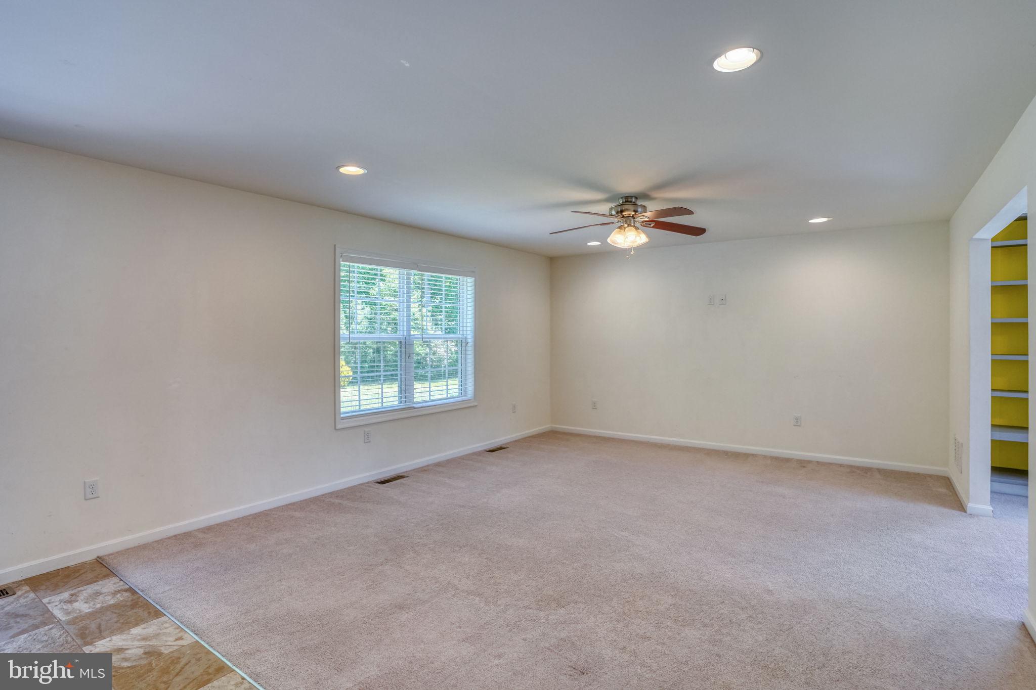 107 Hunters Run Magnolia, DE 19962 - Photo 14 of 41 a view of an empty room with a window