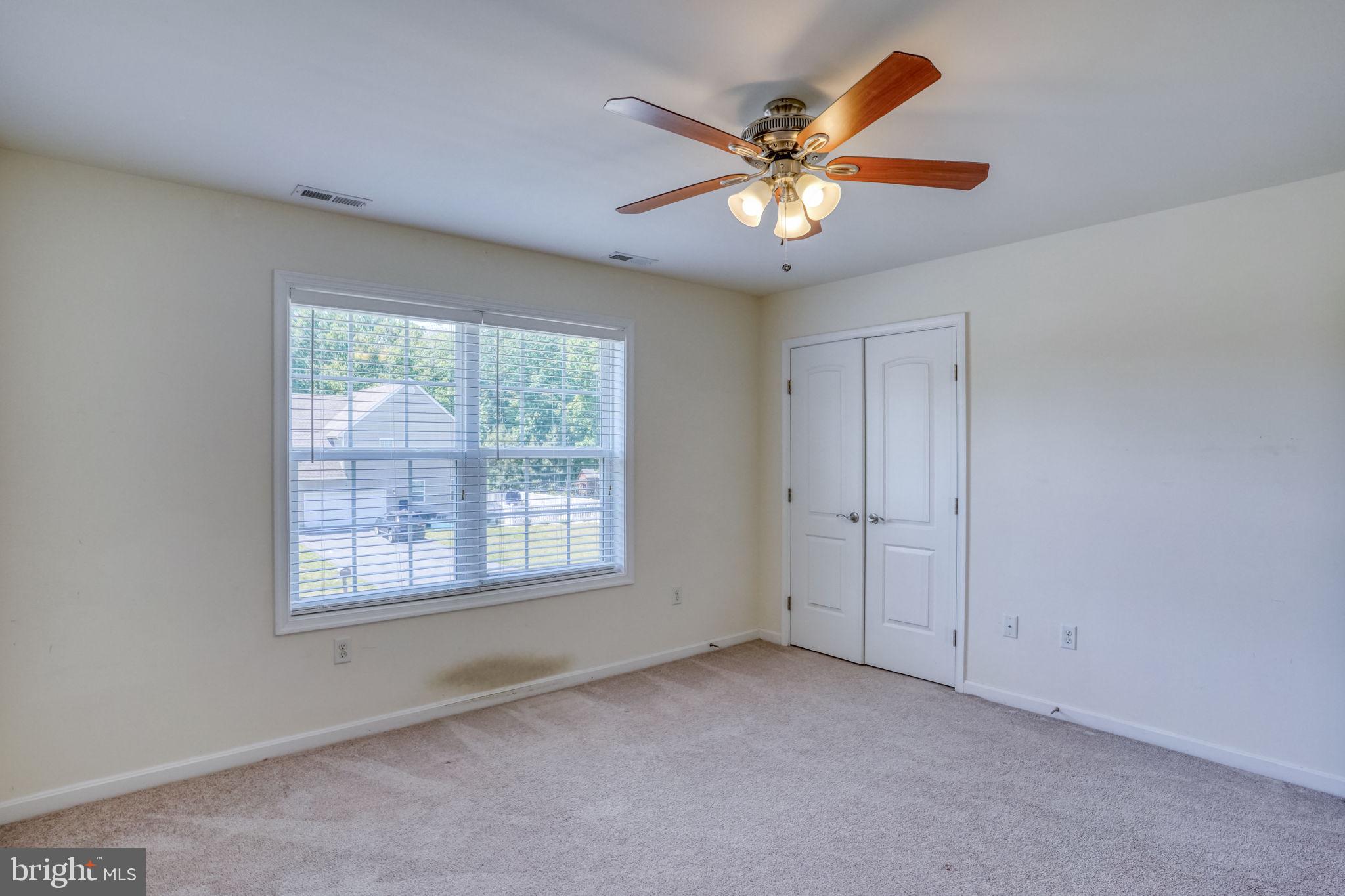 107 Hunters Run Magnolia, DE 19962 - Photo 15 of 41 a view of an empty room with a window
