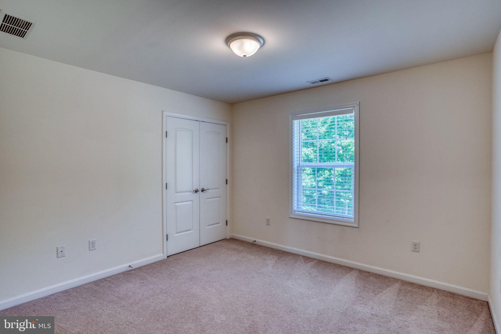 107 Hunters Run Magnolia, DE 19962 - Photo 24 of 41 an empty room with a window and a bathroom