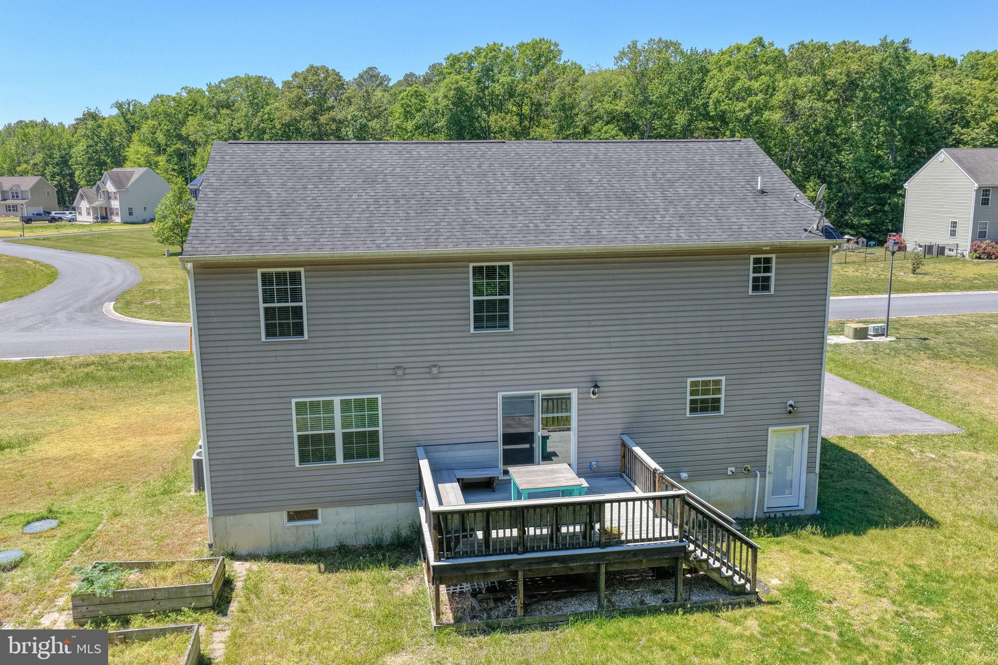 107 Hunters Run Magnolia, DE 19962 - Photo 33 of 41 a aerial view of a house with swimming pool table and chairs