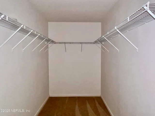 a view of small space with racks on the wall