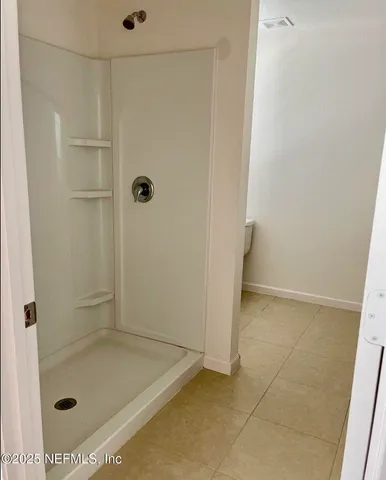 a bathroom with a bath tub