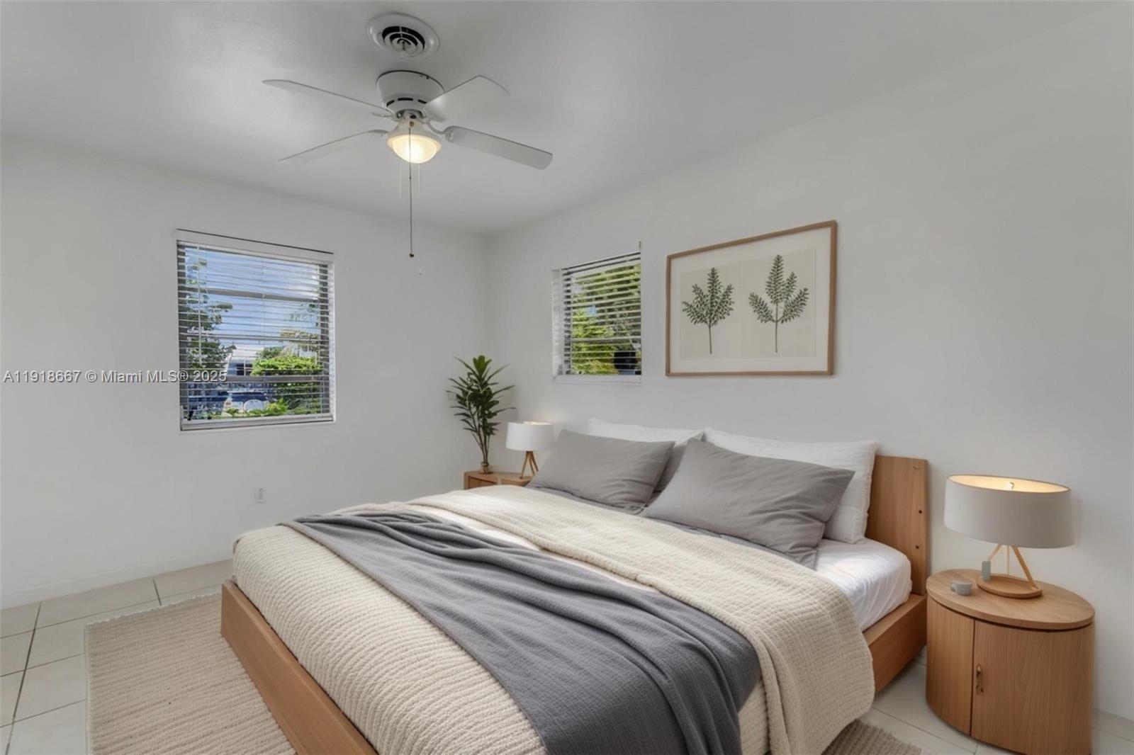16001 Southwest 98th Avenue Miami, FL 33157 - Photo 12 of 22 a bedroom with a bed and a painting on the wall