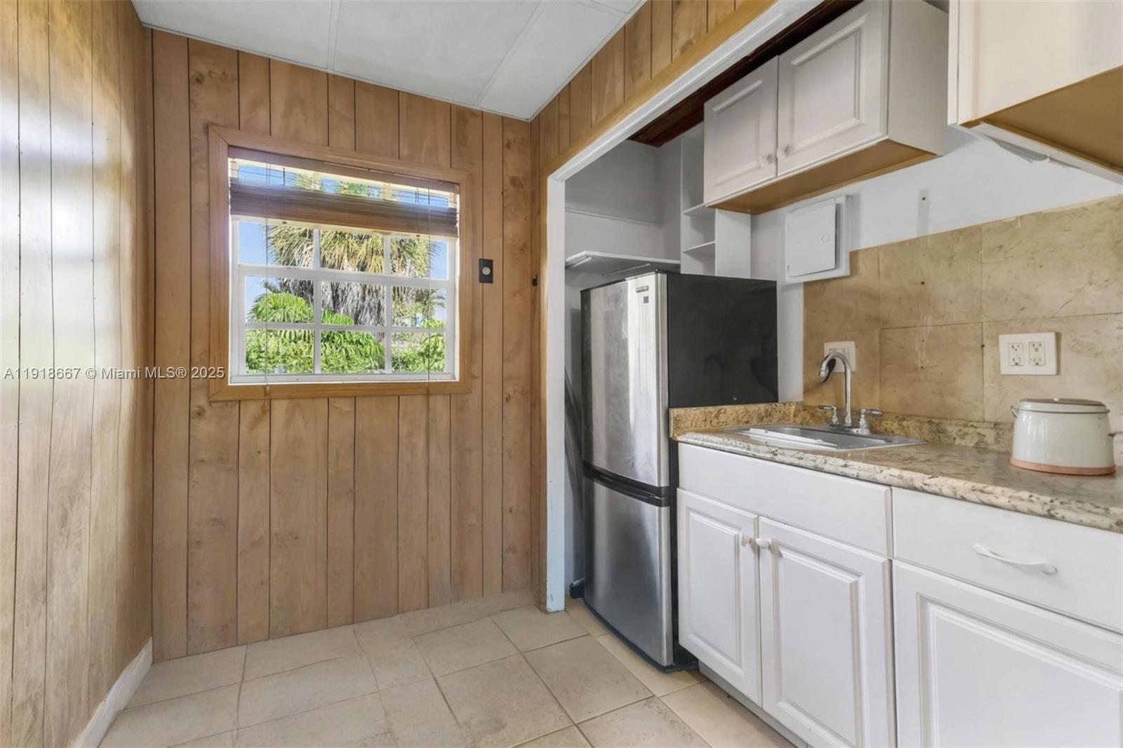16001 Southwest 98th Avenue Miami, FL 33157 - Photo 14 of 22 a kitchen with stainless steel appliances granite countertop a refrigerator and a sink