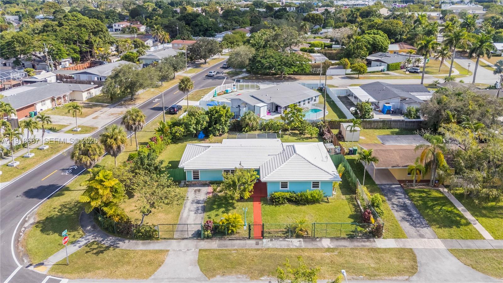 16001 Southwest 98th Avenue Miami, FL 33157 - Photo 21 of 22 an aerial view of residential houses with outdoor space and swimming pool