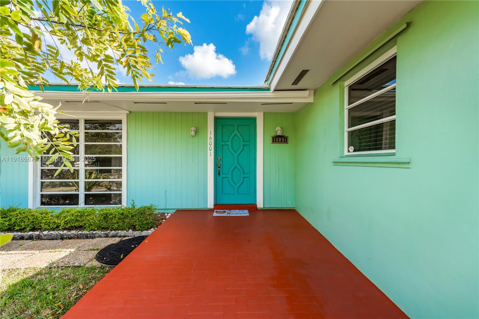 16001 Southwest 98th Avenue Miami, FL 33157 - Photo 3 of 22 a front view of a house
