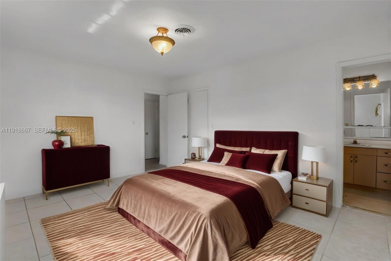 16001 Southwest 98th Avenue Miami, FL 33157 - Photo 9 of 22 a bedroom with a bed and painting on the wall