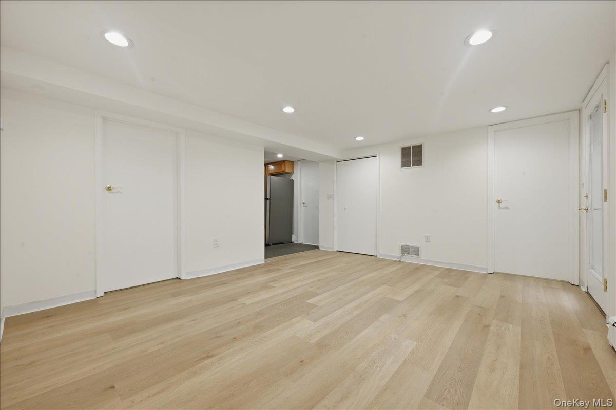 84 North Fordham Road Hicksville, NY 11801 - Photo 18 of 28 a view of an empty room
