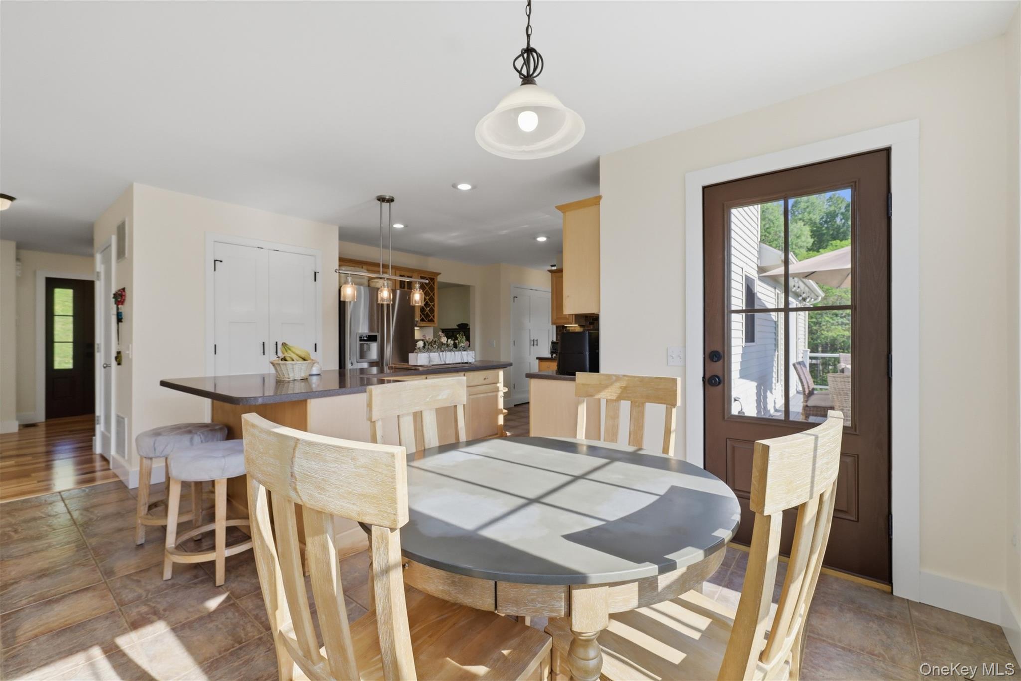 233 Devon Farms Road Stormville, NY 12582 - Photo 14 of 48 a view of a dining room with furniture