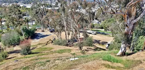 a view of backyard of a house