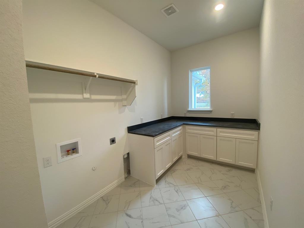 2284 Erwin Road Poolville, TX 76487 - Photo 22 of 24 Large utility room