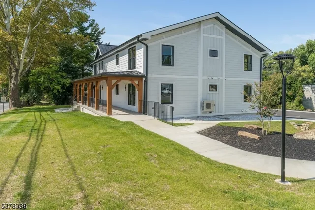 a view of a house with a swimming pool