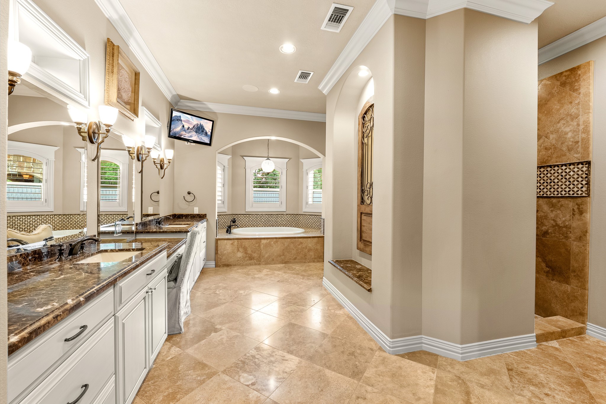 28002 Whispering Maple Way Spring, TX 77386 - Photo 27 of 44 a spacious bathroom with a granite countertop sink and a mirror
