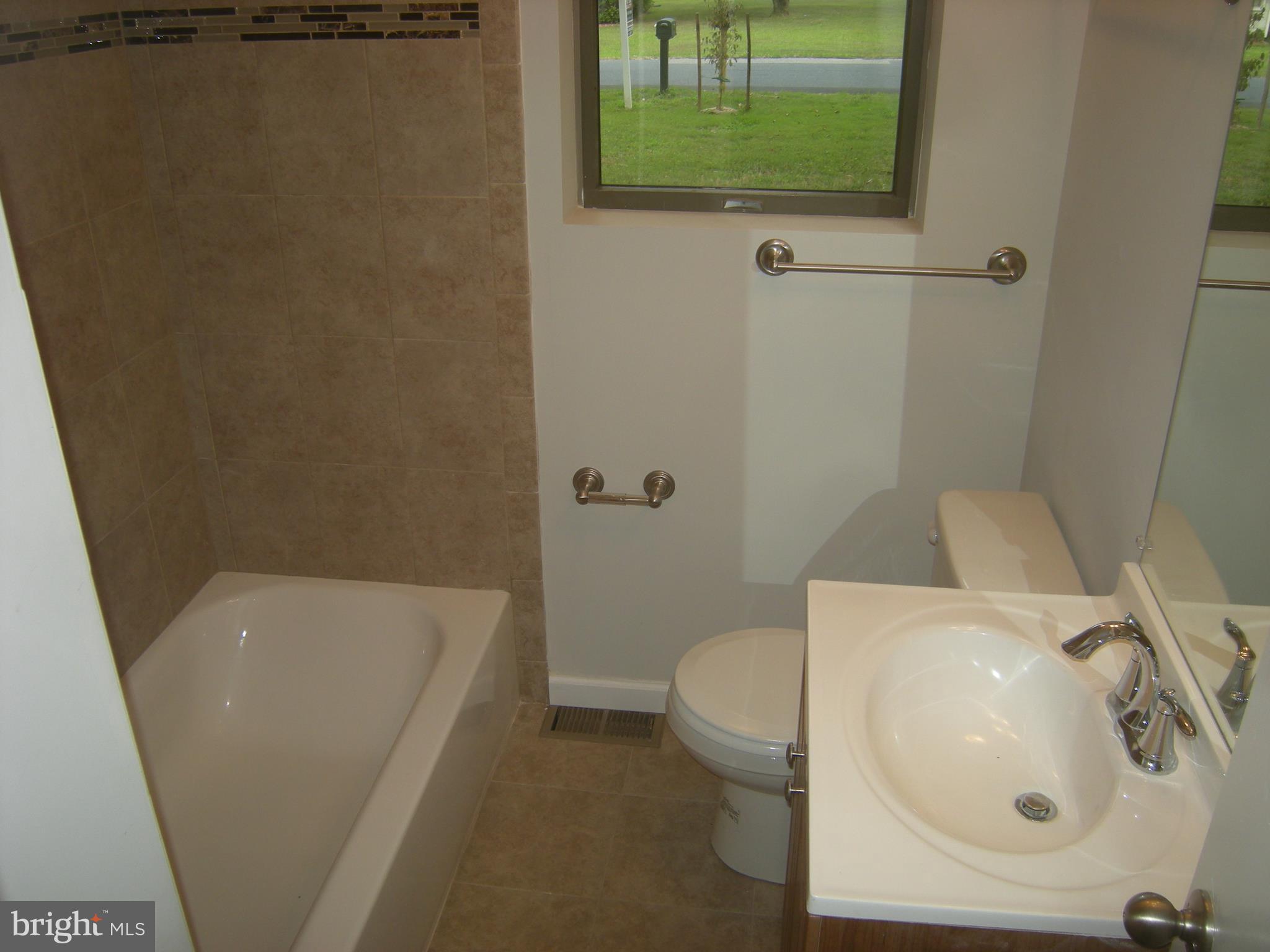 610 Powhatan Beach Road Pasadena, MD 21122 - Photo 15 of 22 First Floor Remodeled Bathroom