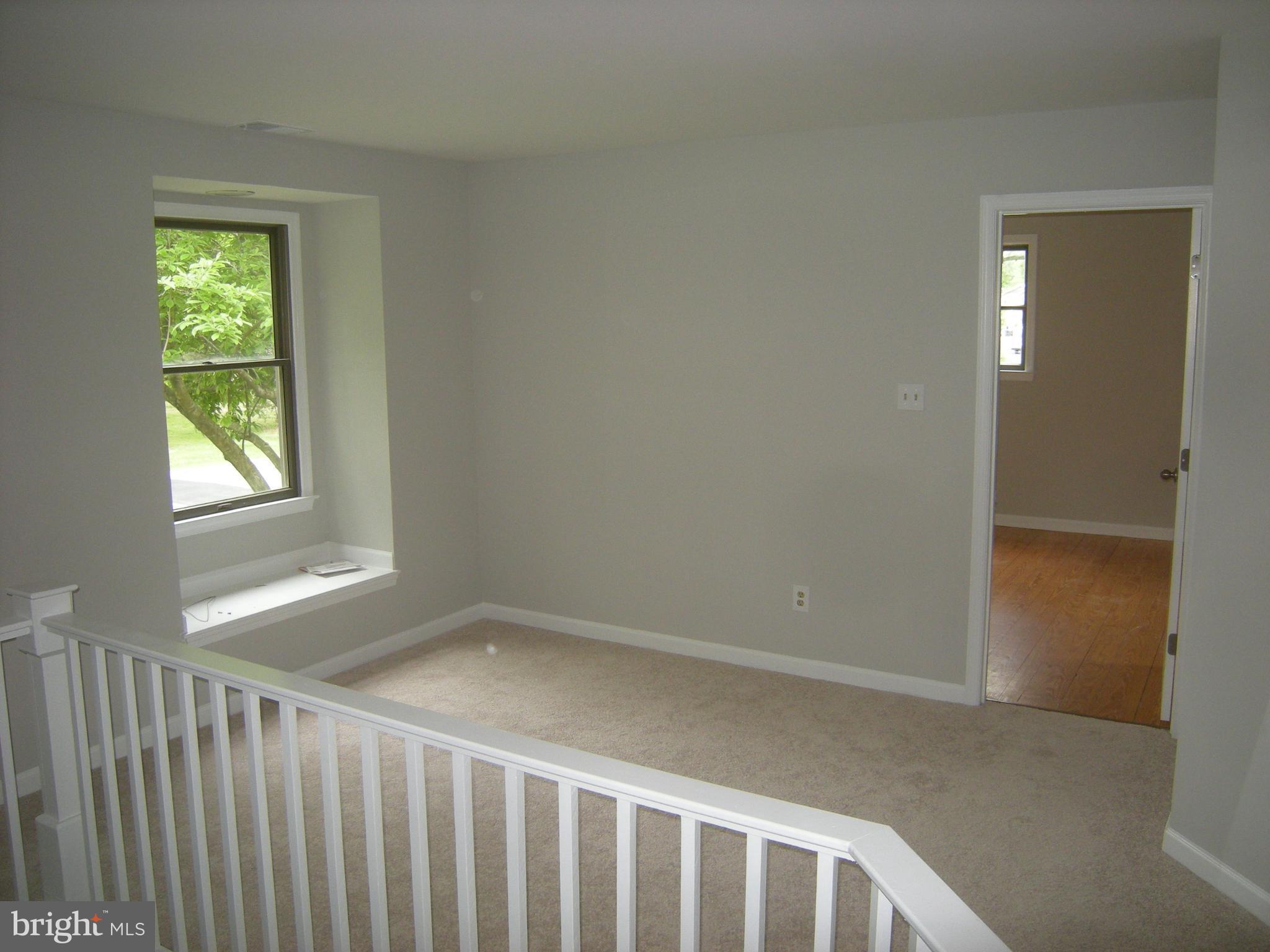 610 Powhatan Beach Road Pasadena, MD 21122 - Photo 4 of 22 Sitting Area overlooking Living Room