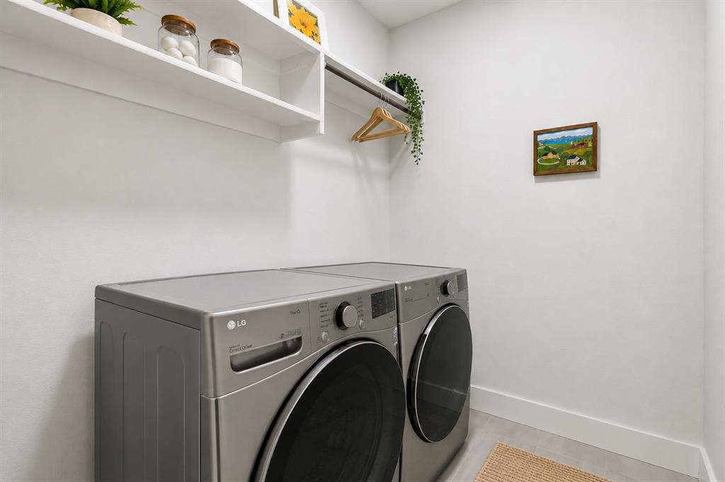 6527 Bowman Roberts Road Fort Worth, TX 76179 - Photo 23 of 27 Functional Laundry Space with Built-in Shelves