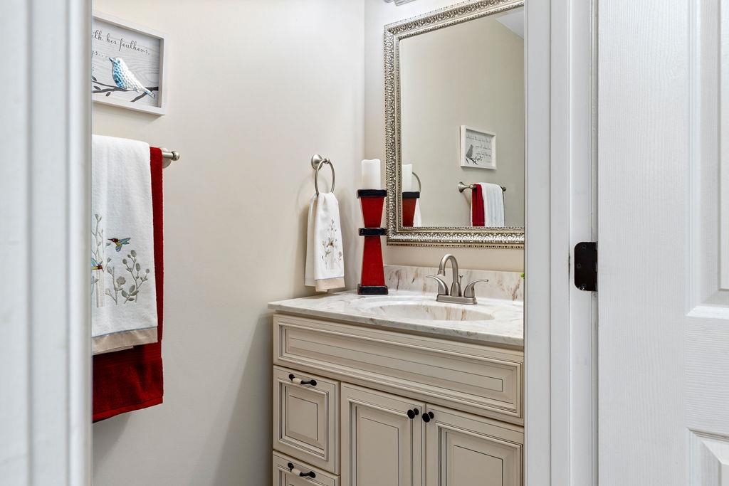 1401 Guthrie Road Stuarts Draft, VA 24477 - Photo 26 of 71 a bathroom with a sink and a mirror