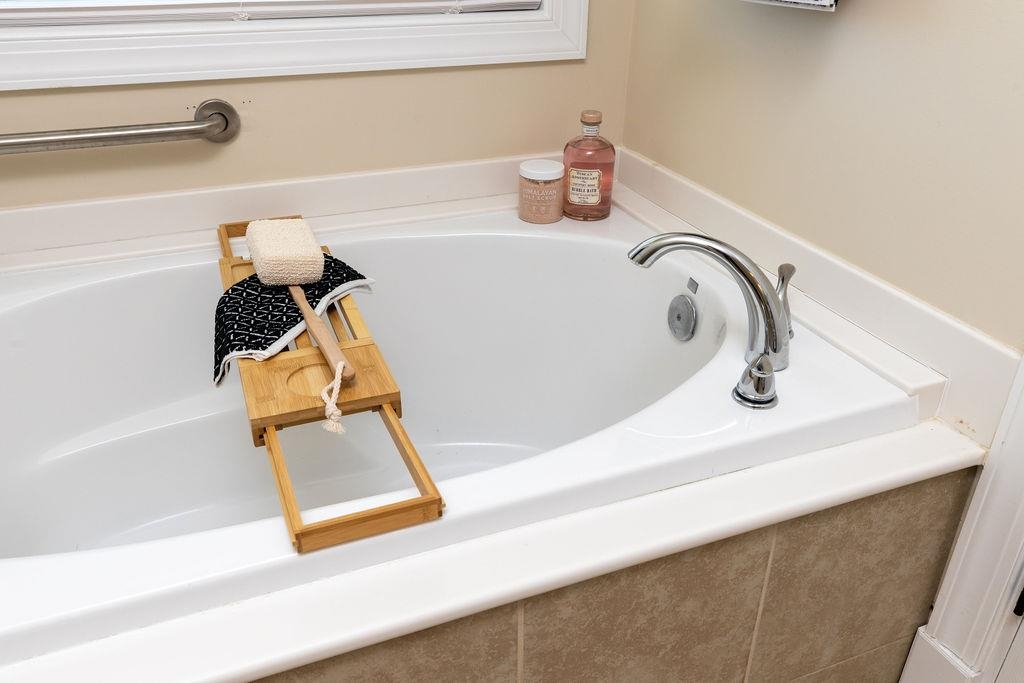 1401 Guthrie Road Stuarts Draft, VA 24477 - Photo 33 of 71 a bathroom with a sink and a bathtub
