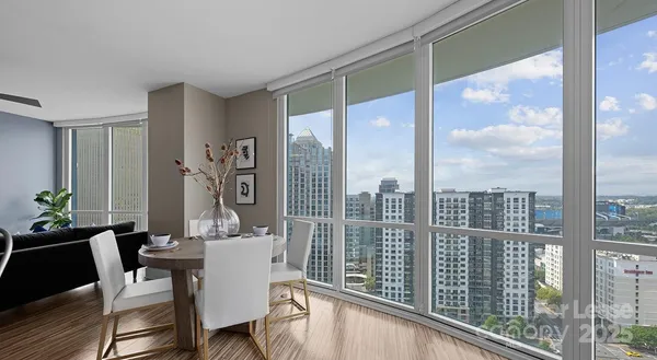 a view of a dining room with furniture window and outside view