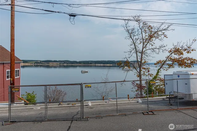 a view of a street with sitting area
