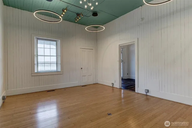 a view of an empty room with a window