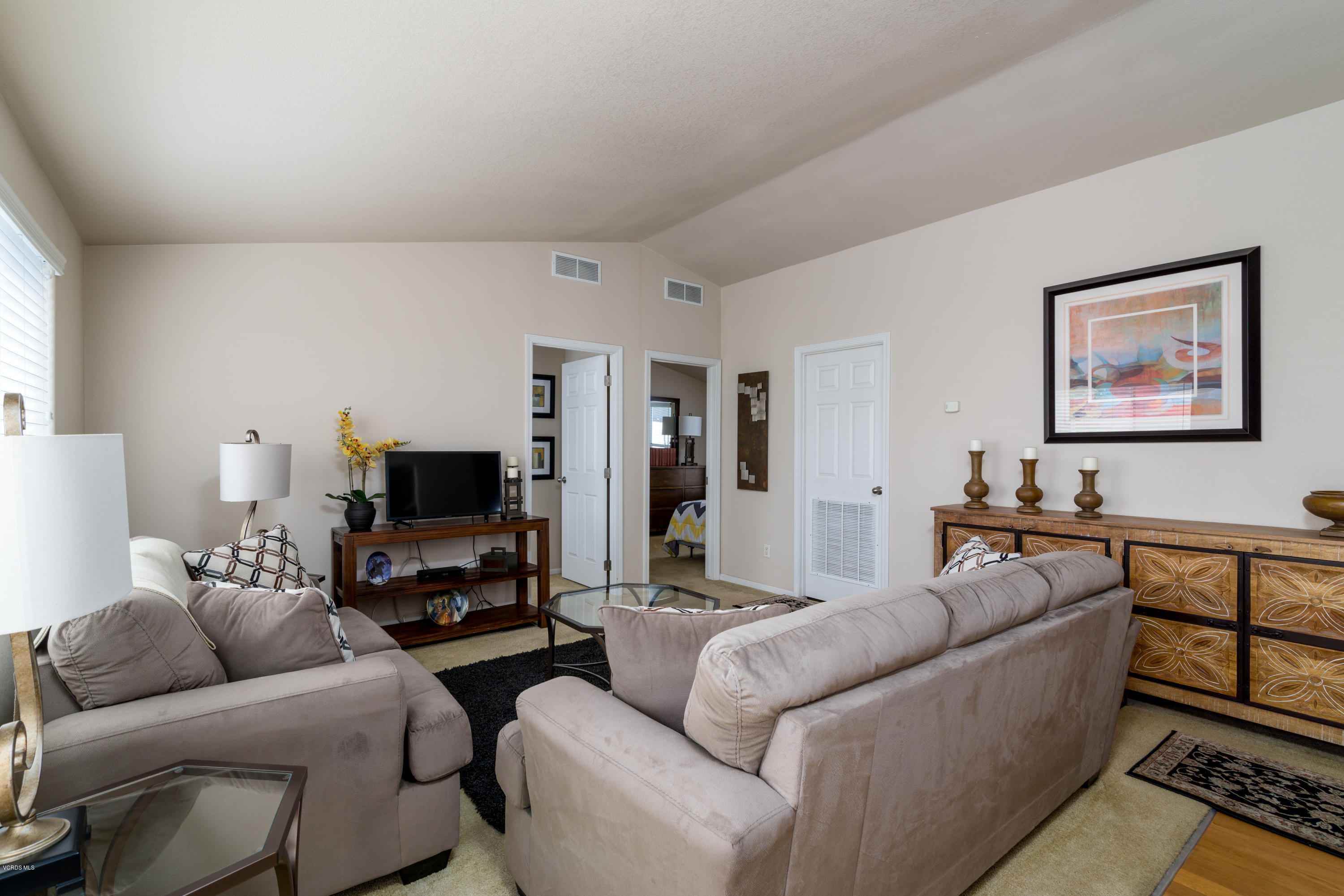 2132 Bluejay Avenue Oxnard, CA 93033 - Photo 11 of 20 a living room with furniture and a flat screen tv