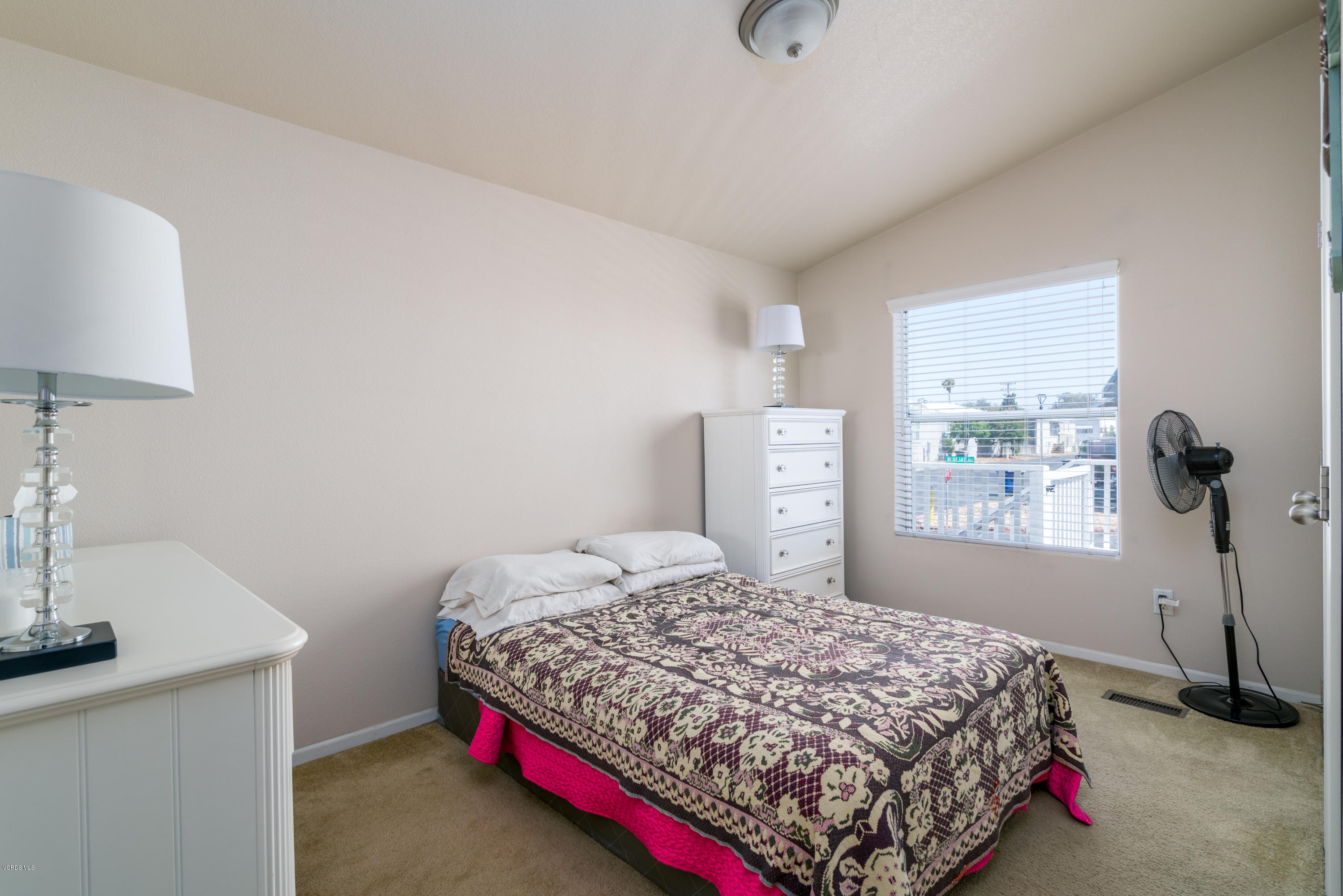 2132 Bluejay Avenue Oxnard, CA 93033 - Photo 12 of 20 a bedroom with a bed and a window