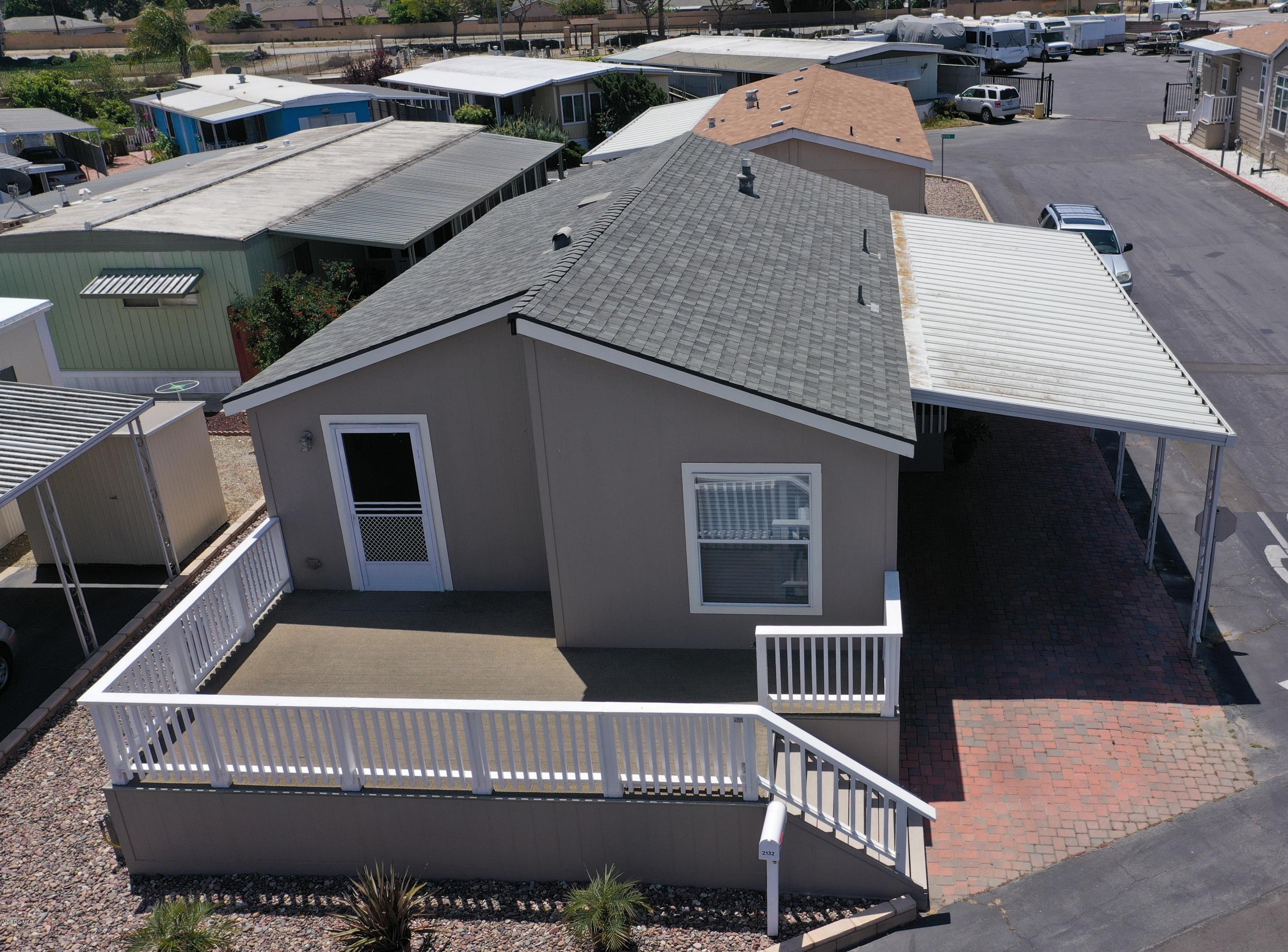 2132 Bluejay Avenue Oxnard, CA 93033 - Photo 20 of 20 a balcony with a table and chairs