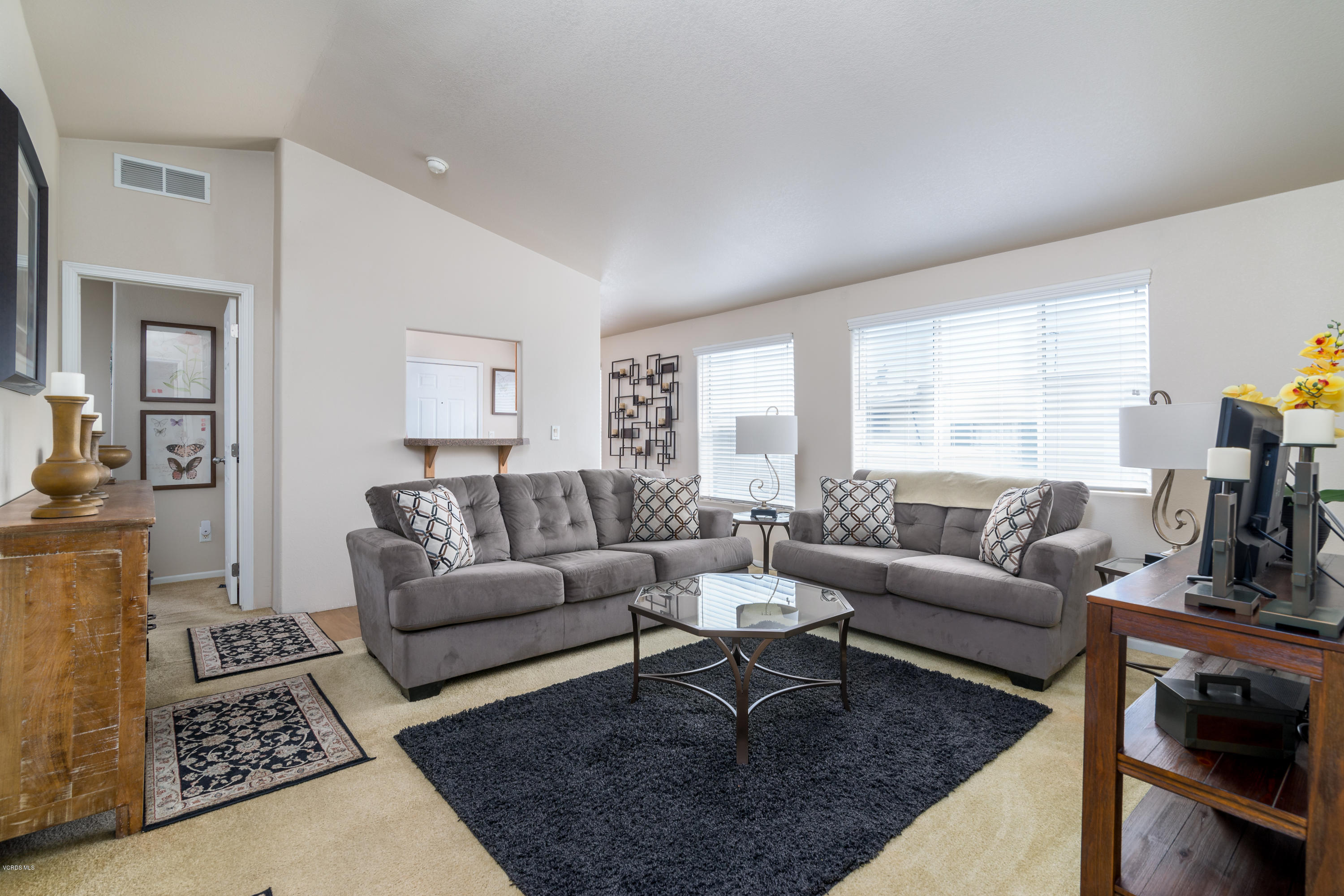 2132 Bluejay Avenue Oxnard, CA 93033 - Photo 10 of 20 a living room with furniture and a couch