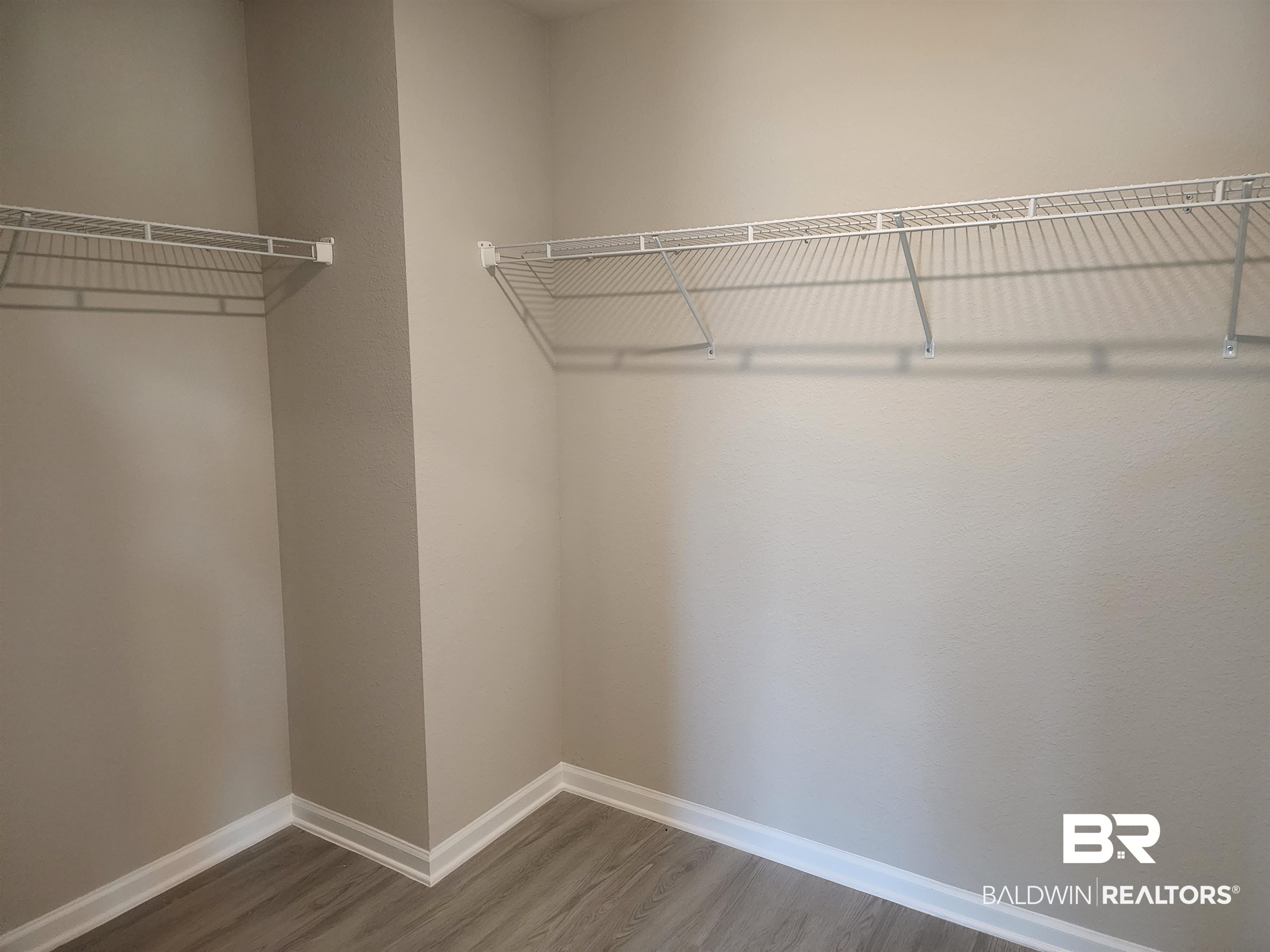 24516 Broken Sound Loop Orange Beach, AL 36561 - Photo 8 of 11 Primary bedroom closet