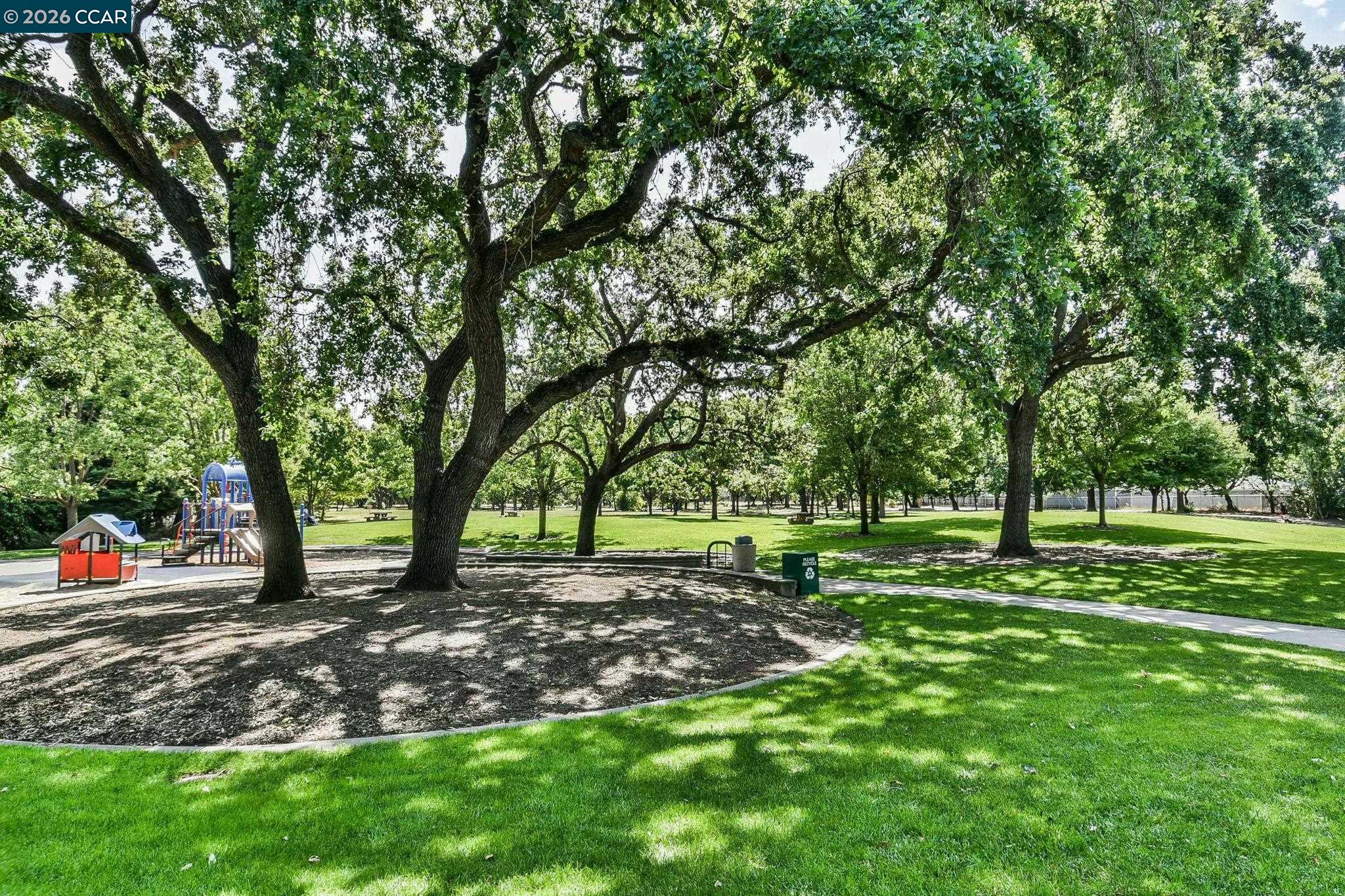 2586 Oak Road, Unit 130 Walnut Creek, CA 94597 - Photo 29 of 31 a view of a park with tree s