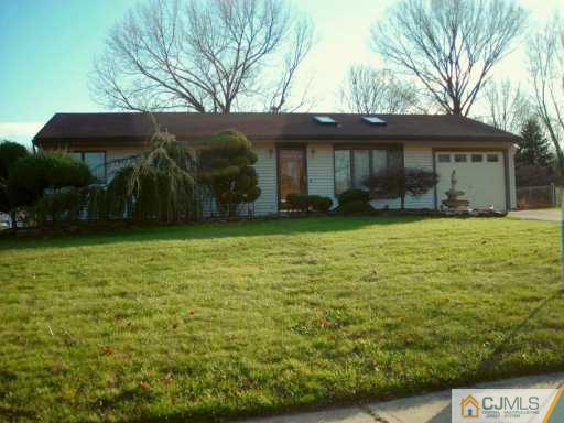 6 Pelham Road Kendall Park, NJ 08824 - Photo 4 of 4 a view of a house with a yard
