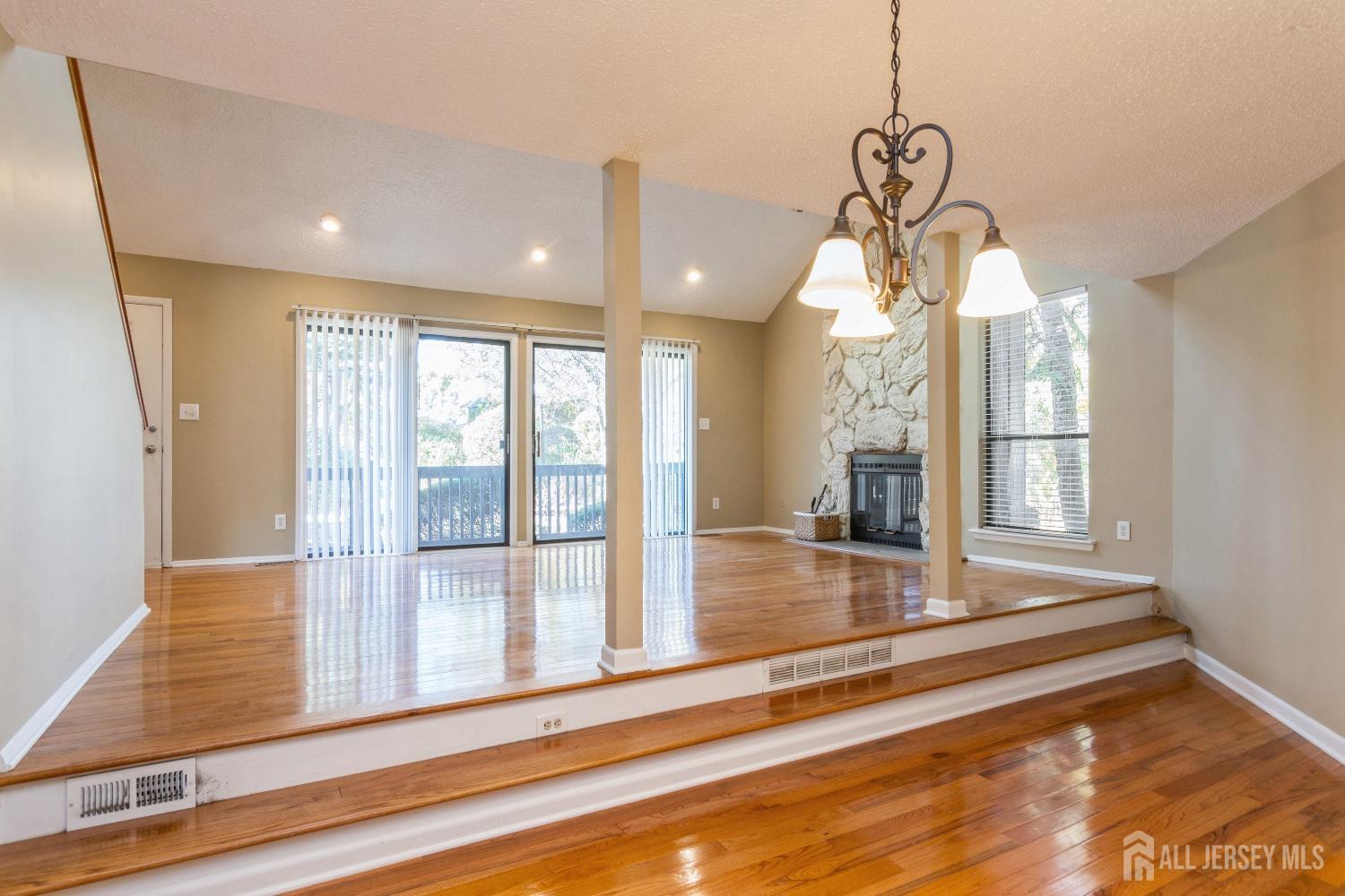 464 Westgate Drive Edison, NJ 08820 - Photo 11 of 31 a view of a room with wooden floor and windows
