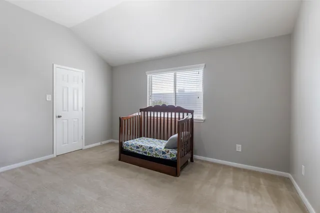 a room with gym equipment and appliances