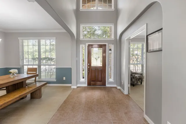 a view of livingroom with furniture and windows
