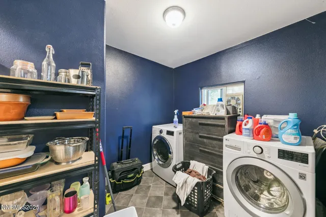 a storage room with washer and dryer