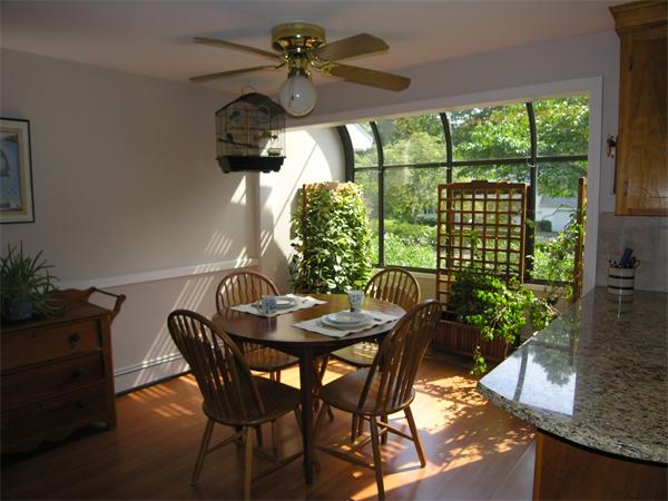 89 Brook Trail Road Concord, MA 01742 - Photo 3 of 18 a dining room with furniture and a large window