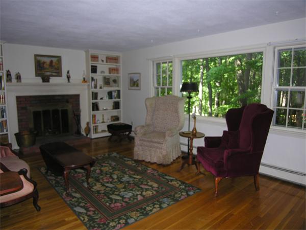 89 Brook Trail Road Concord, MA 01742 - Photo 8 of 18 a living room with furniture and a fireplace
