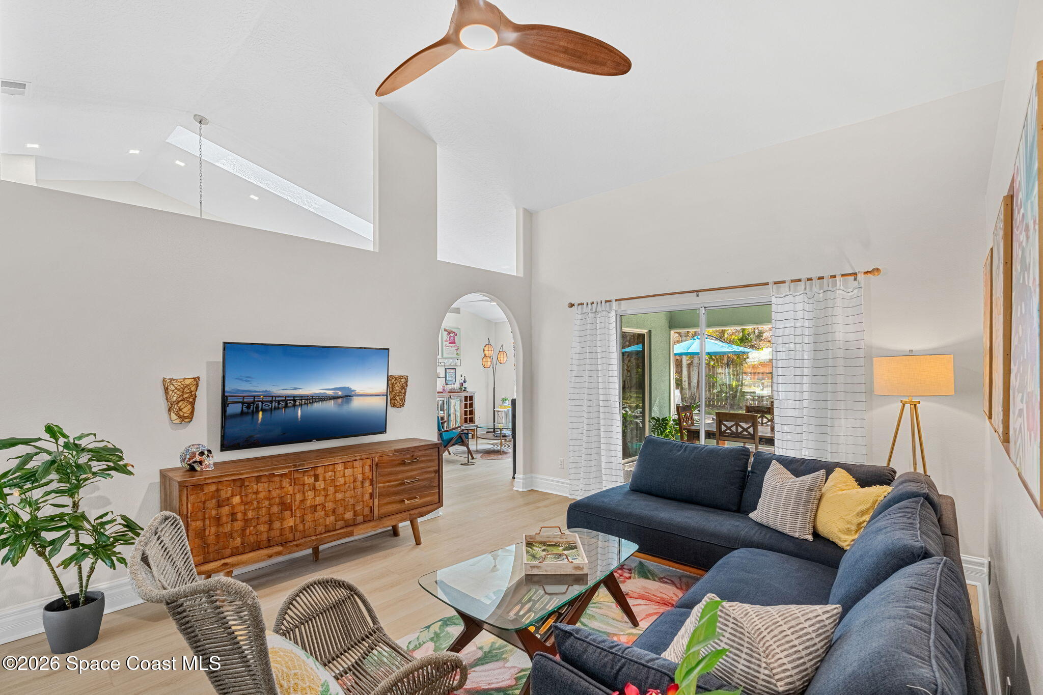 3 Jennifer Circle Indialantic, FL 32903 - Photo 13 of 61 a living room with furniture and a flat screen tv