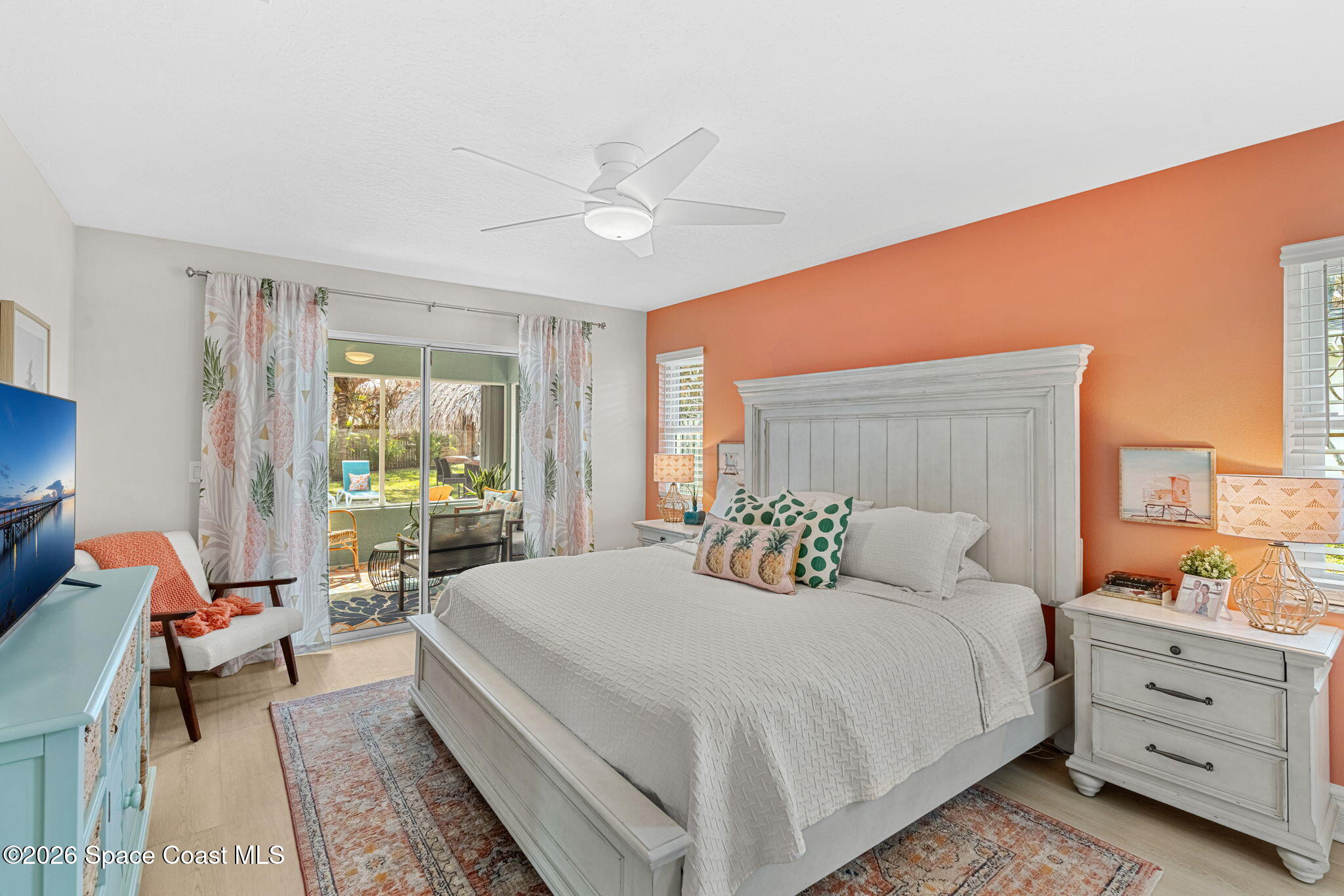 3 Jennifer Circle Indialantic, FL 32903 - Photo 31 of 61 a bedroom with a bed and wooden floor