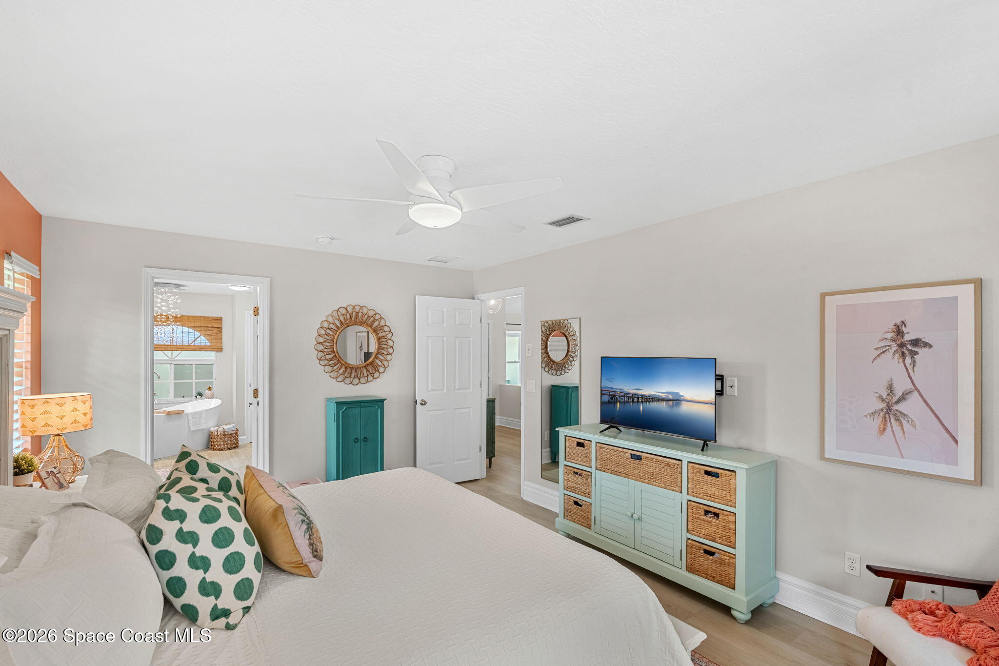 3 Jennifer Circle Indialantic, FL 32903 - Photo 32 of 61 a bedroom with a bed and wooden floor