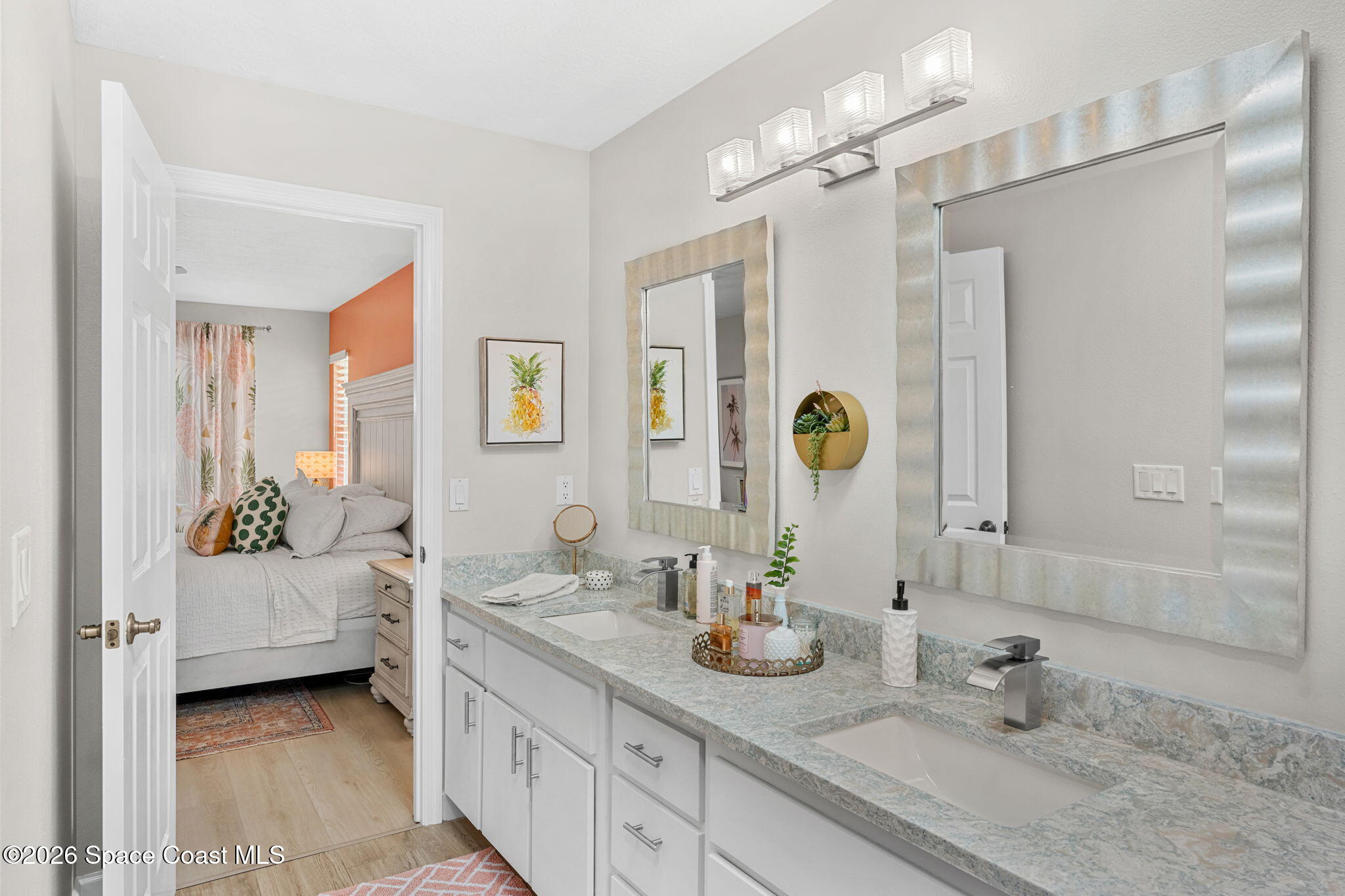 3 Jennifer Circle Indialantic, FL 32903 - Photo 33 of 61 a bathroom with a granite countertop sink and a mirror