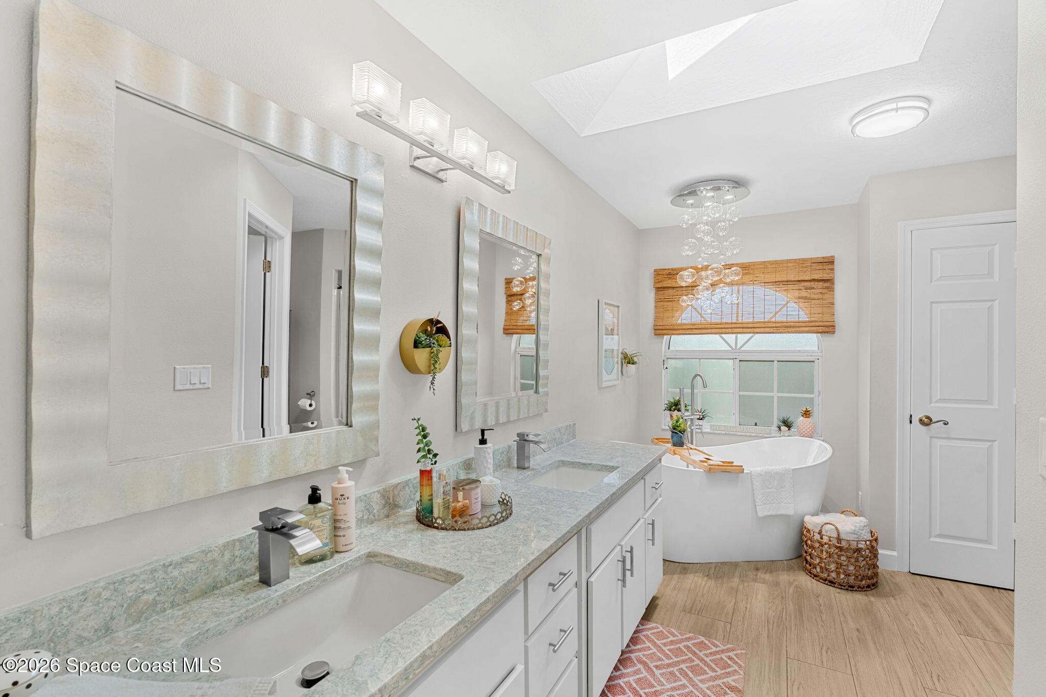 3 Jennifer Circle Indialantic, FL 32903 - Photo 34 of 61 a bathroom with a double vanity sink mirror and