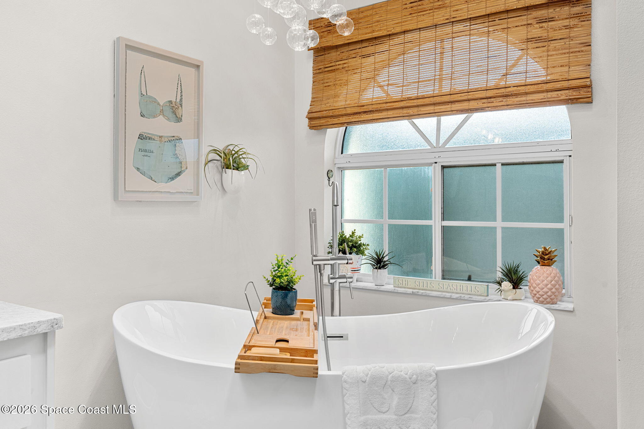 3 Jennifer Circle Indialantic, FL 32903 - Photo 35 of 61 a white bath tub sitting next to a window